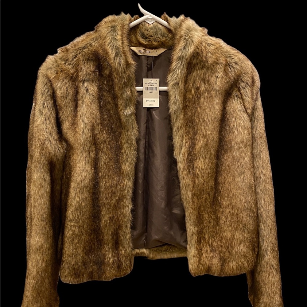 Chic Hollister soft Faux fur jacket. New with tags. Black satin lining